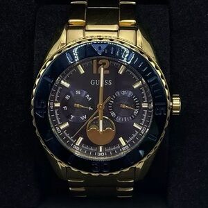 GUESS Moon Phase Women’s Analog Watch U0565L4 Gold Tone Blue Face